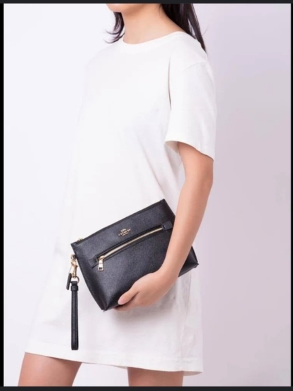 Coach Black Leather Wristlet with Gold Zip Detail